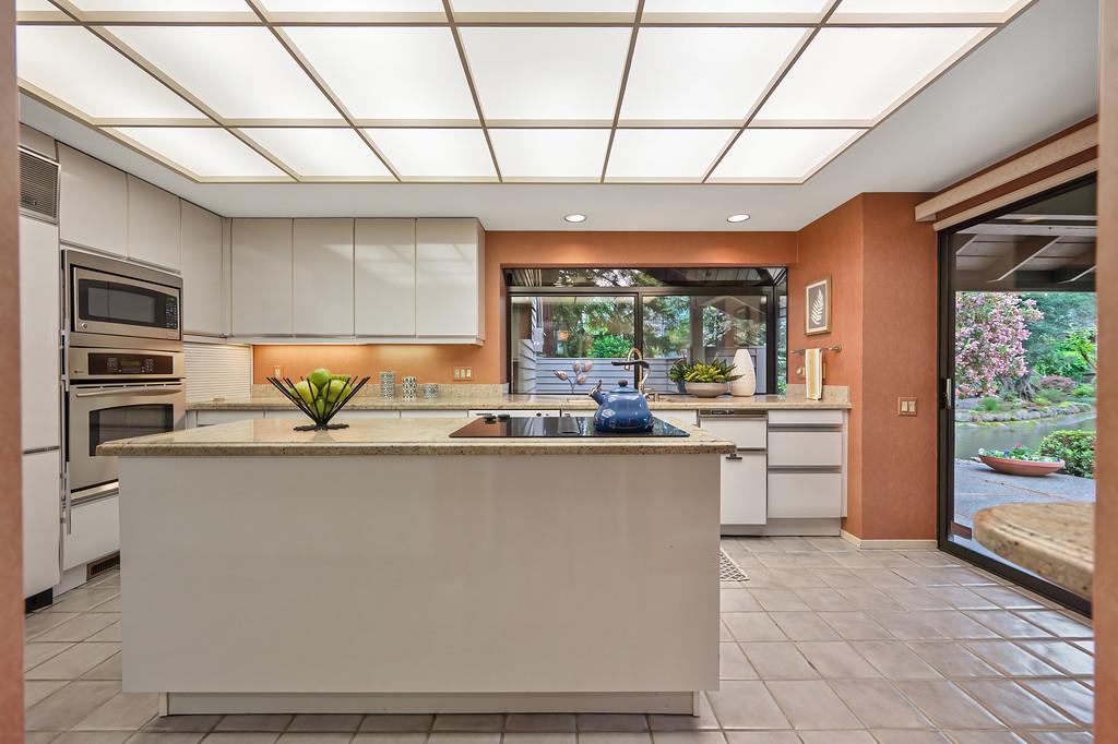 7650 Pineridge Road Fair Oaks, CA 95628 - Photo 14 of 67 Large kitchen with sliding glass doors to the back patio