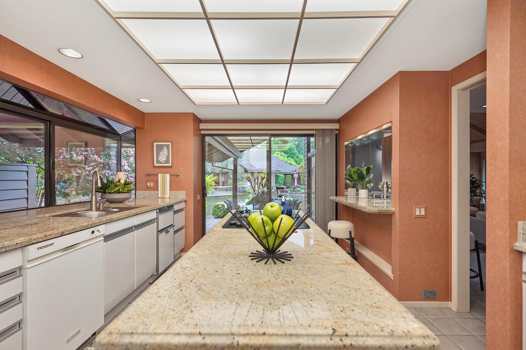 7650 Pineridge Road Fair Oaks, CA 95628 - Photo 18 of 67 Large kitchen with sliding glass doors to the back patio