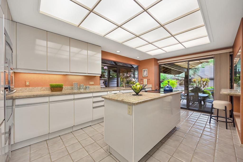 7650 Pineridge Road Fair Oaks, CA 95628 - Photo 19 of 67 Large kitchen with sliding glass doors to the back patio