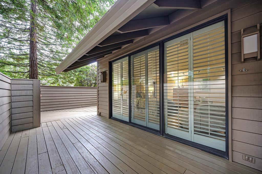 7650 Pineridge Road Fair Oaks, CA 95628 - Photo 31 of 67 Primary bedroom with sliding glass doors to the wrap-around deck