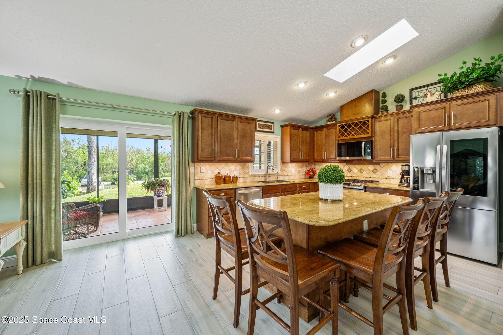 4385 Windover Way Melbourne, FL 32934 - Photo 22 of 44 a view of a dining room with furniture window and outside view