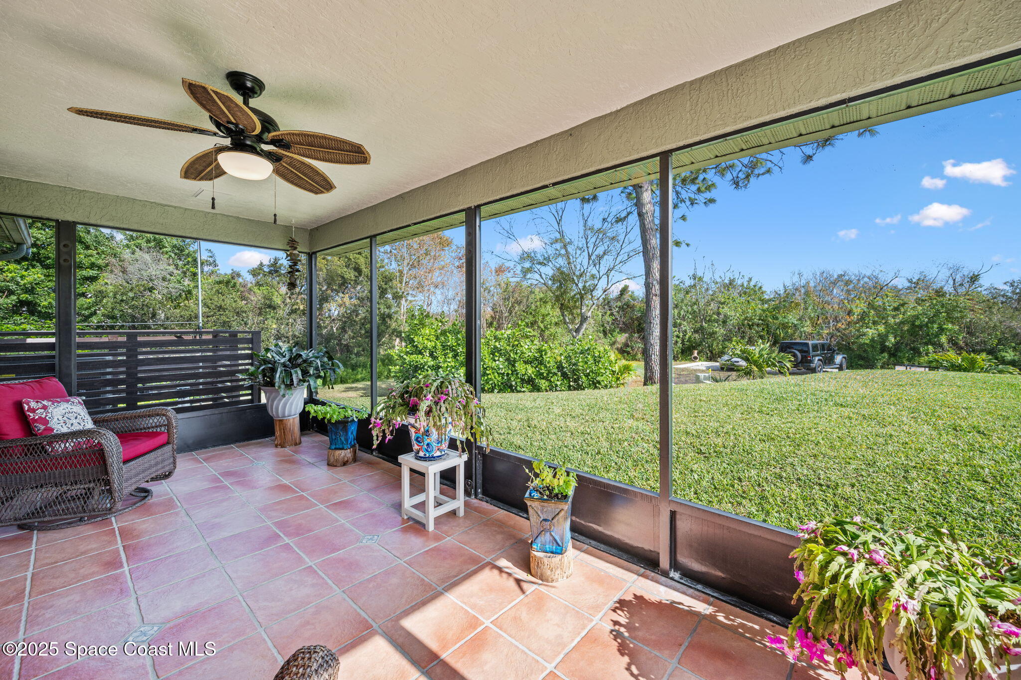 4385 Windover Way Melbourne, FL 32934 - Photo 33 of 44 a view of a porch with chairs and backyard