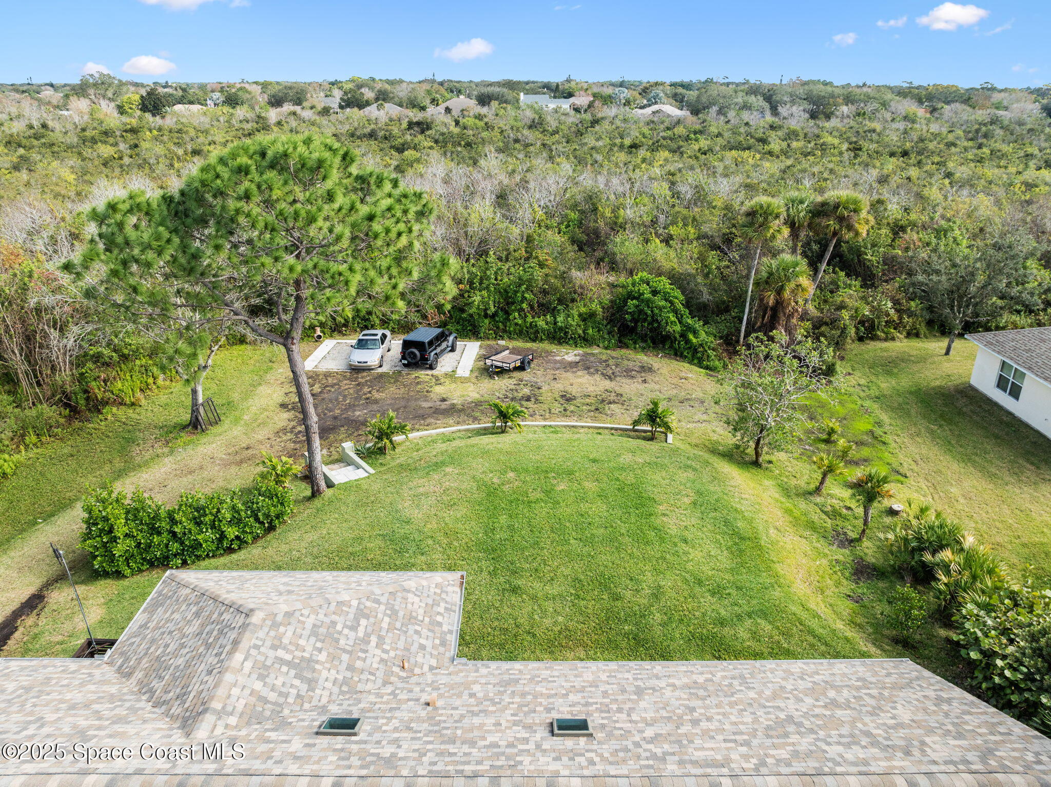 4385 Windover Way Melbourne, FL 32934 - Photo 4 of 44 a view of a garden with an outdoor space
