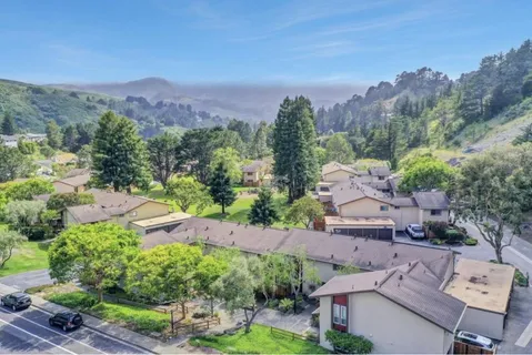 a view of a city with a mountain