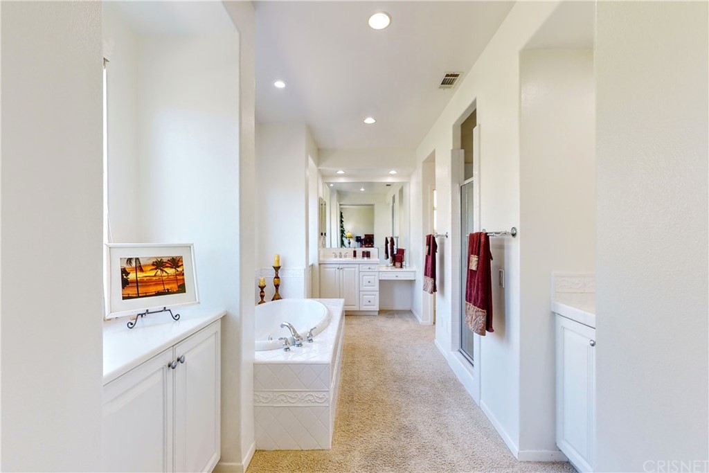 953 Clear Sky Place Simi Valley, CA 93065 - Photo 32 of 53 a living room with furniture and a flat screen tv