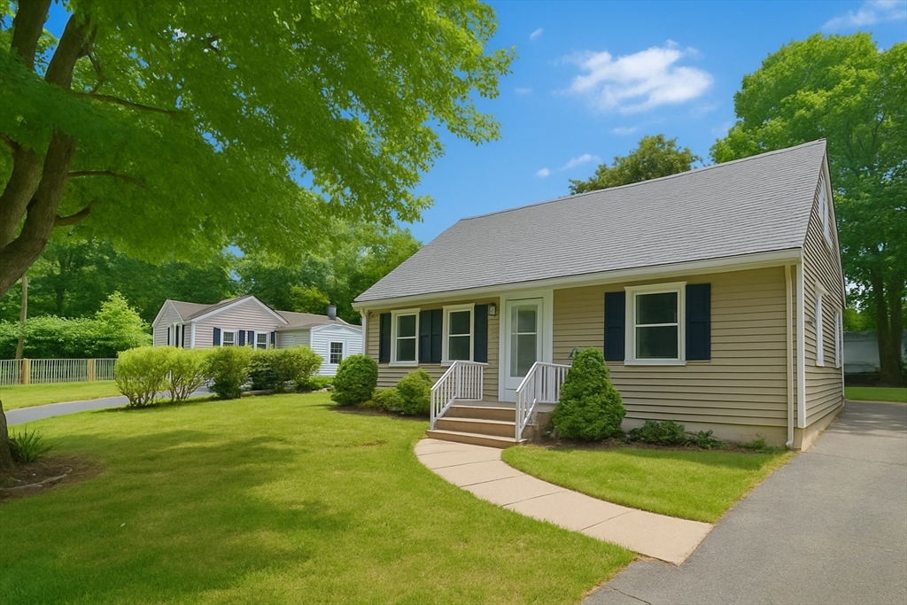 94 David Street Springfield, MA 01104 - Photo 1 of 39 a front view of a house with a yard