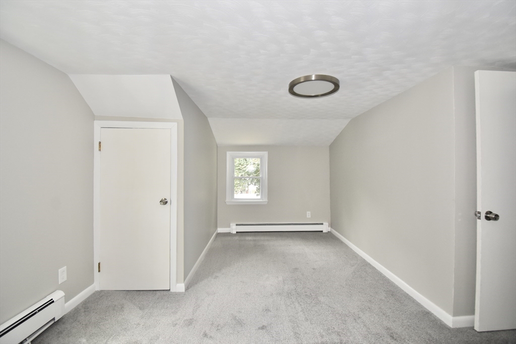 94 David Street Springfield, MA 01104 - Photo 12 of 39 an empty room with windows