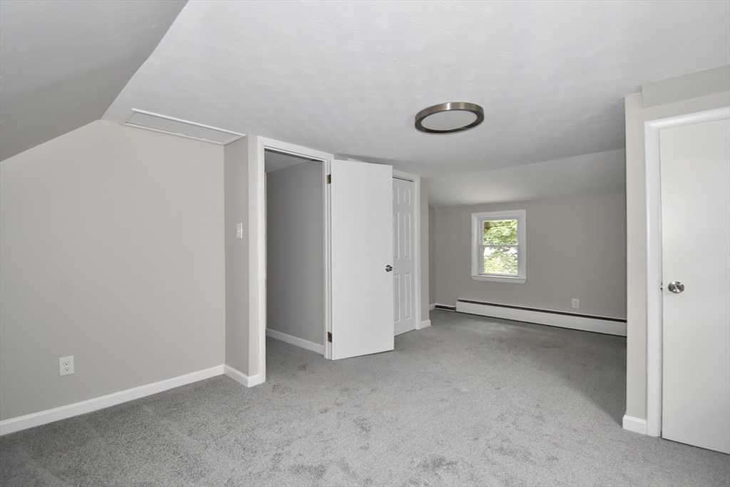 94 David Street Springfield, MA 01104 - Photo 15 of 39 a view of an empty room with a window