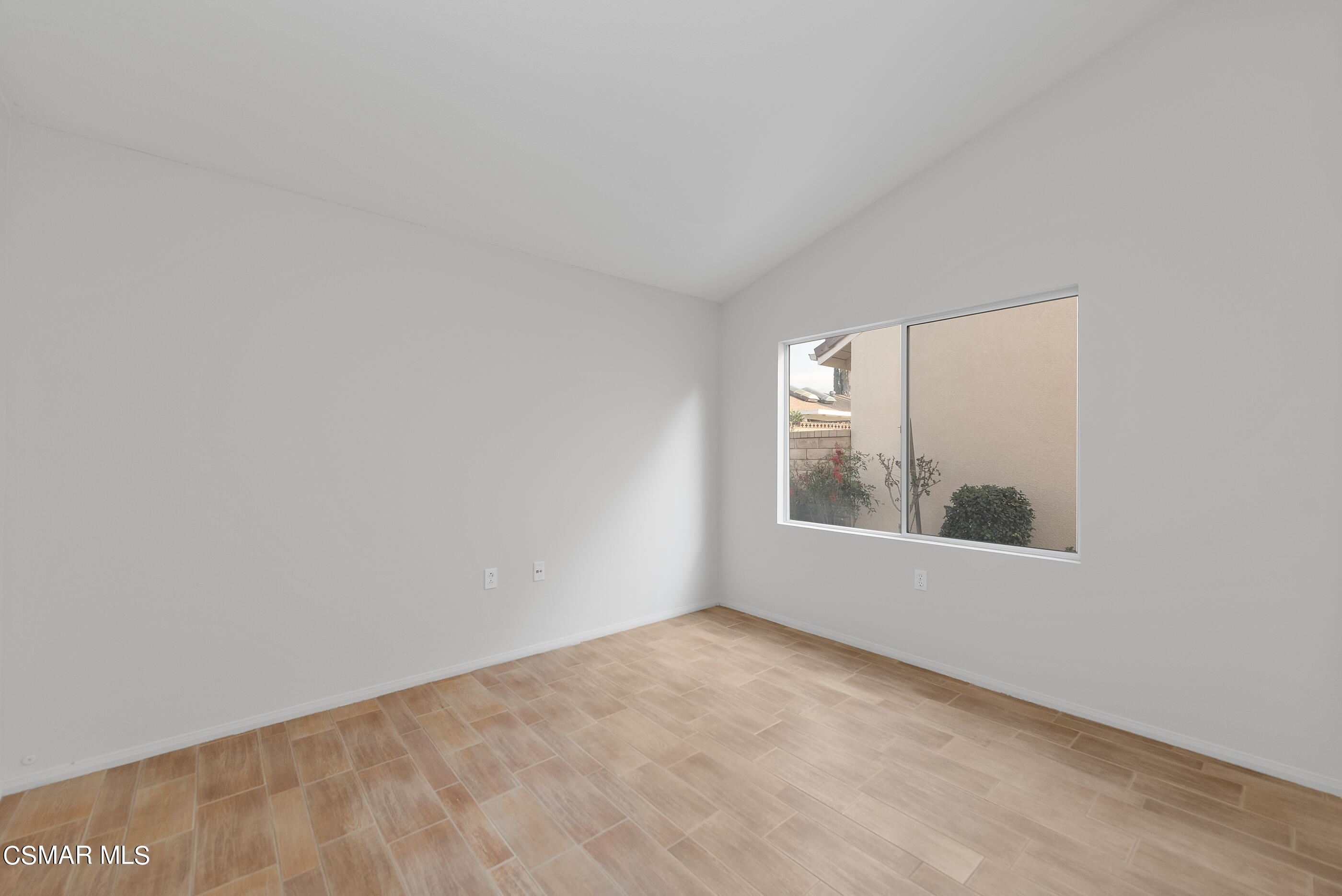 5641 Daisy Street Simi Valley, CA 93063 - Photo 20 of 49 a view of an empty room with a window