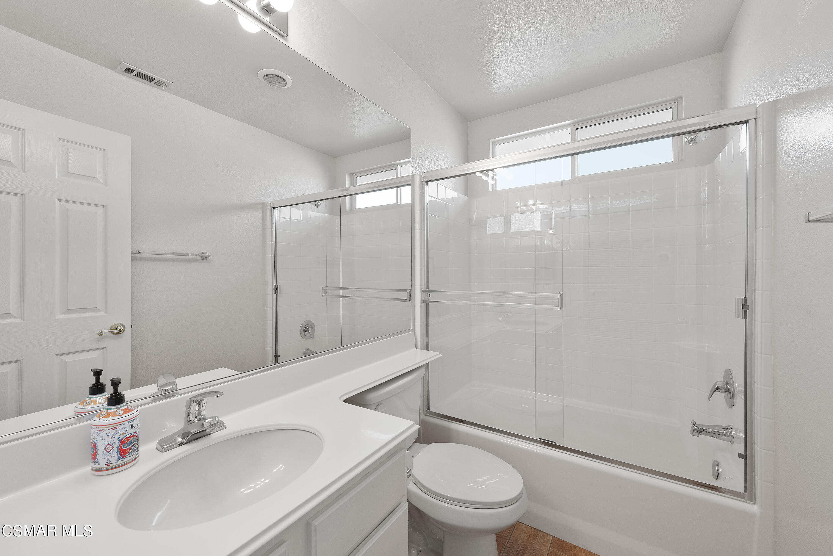 5641 Daisy Street Simi Valley, CA 93063 - Photo 22 of 49 a bathroom with a sink toilet and shower