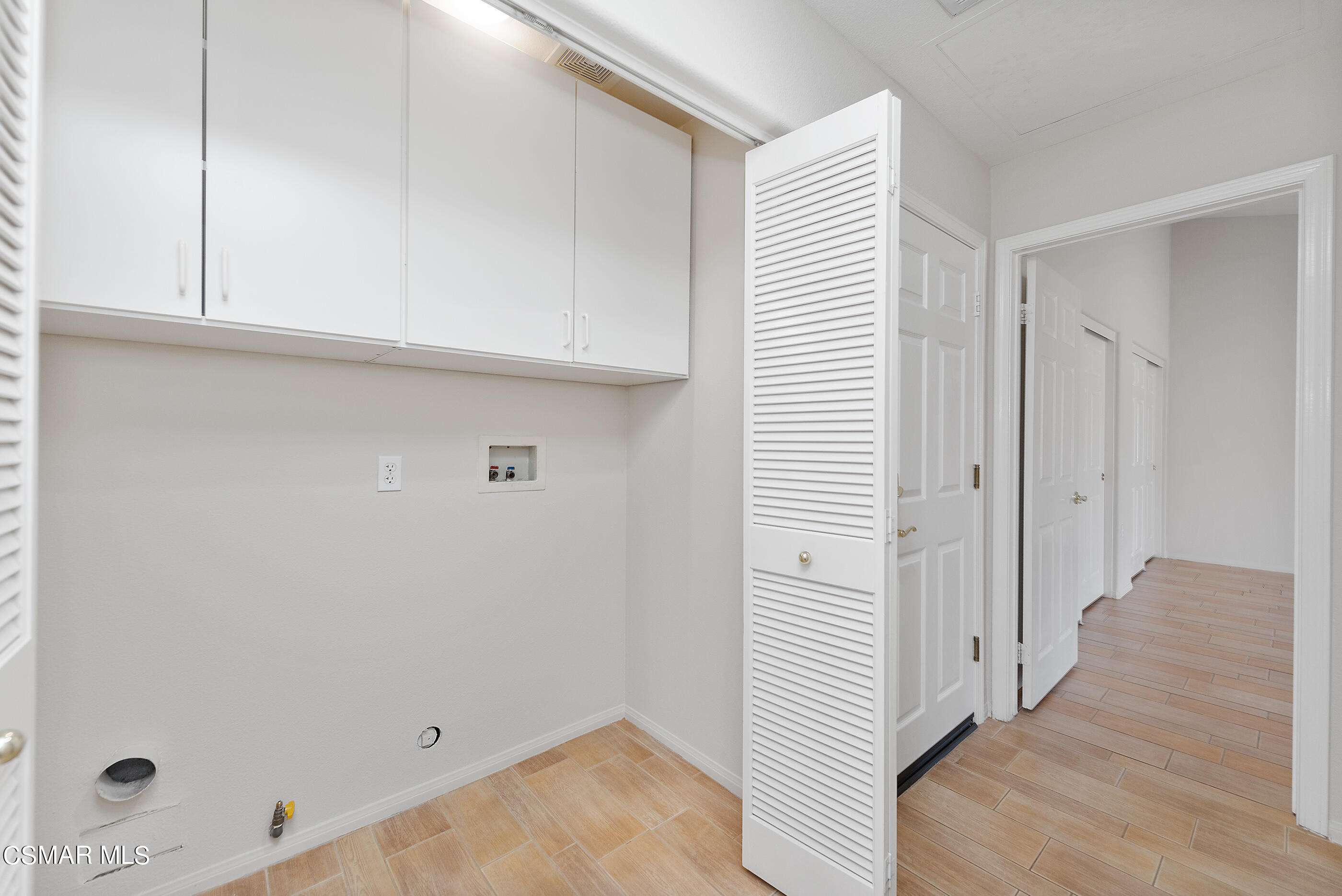 5641 Daisy Street Simi Valley, CA 93063 - Photo 29 of 49 Hall Laundry Closet
