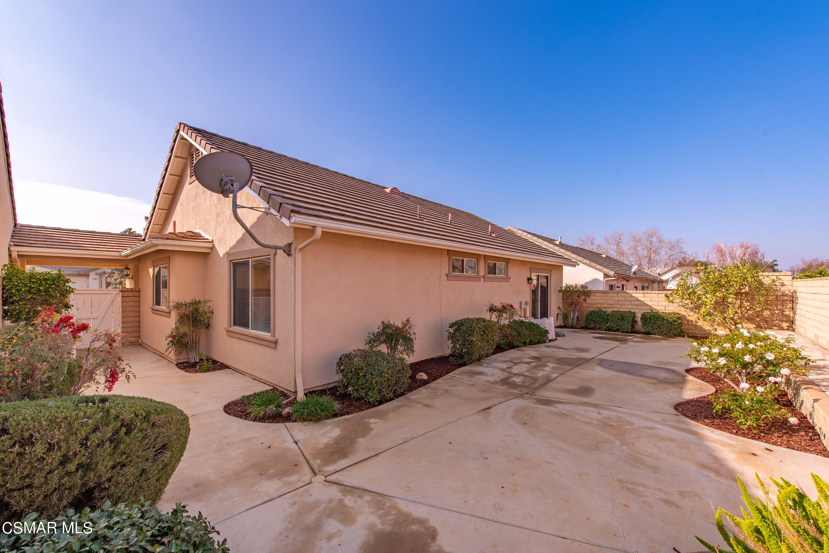5641 Daisy Street Simi Valley, CA 93063 - Photo 35 of 49 a backyard of a house with flower plants
