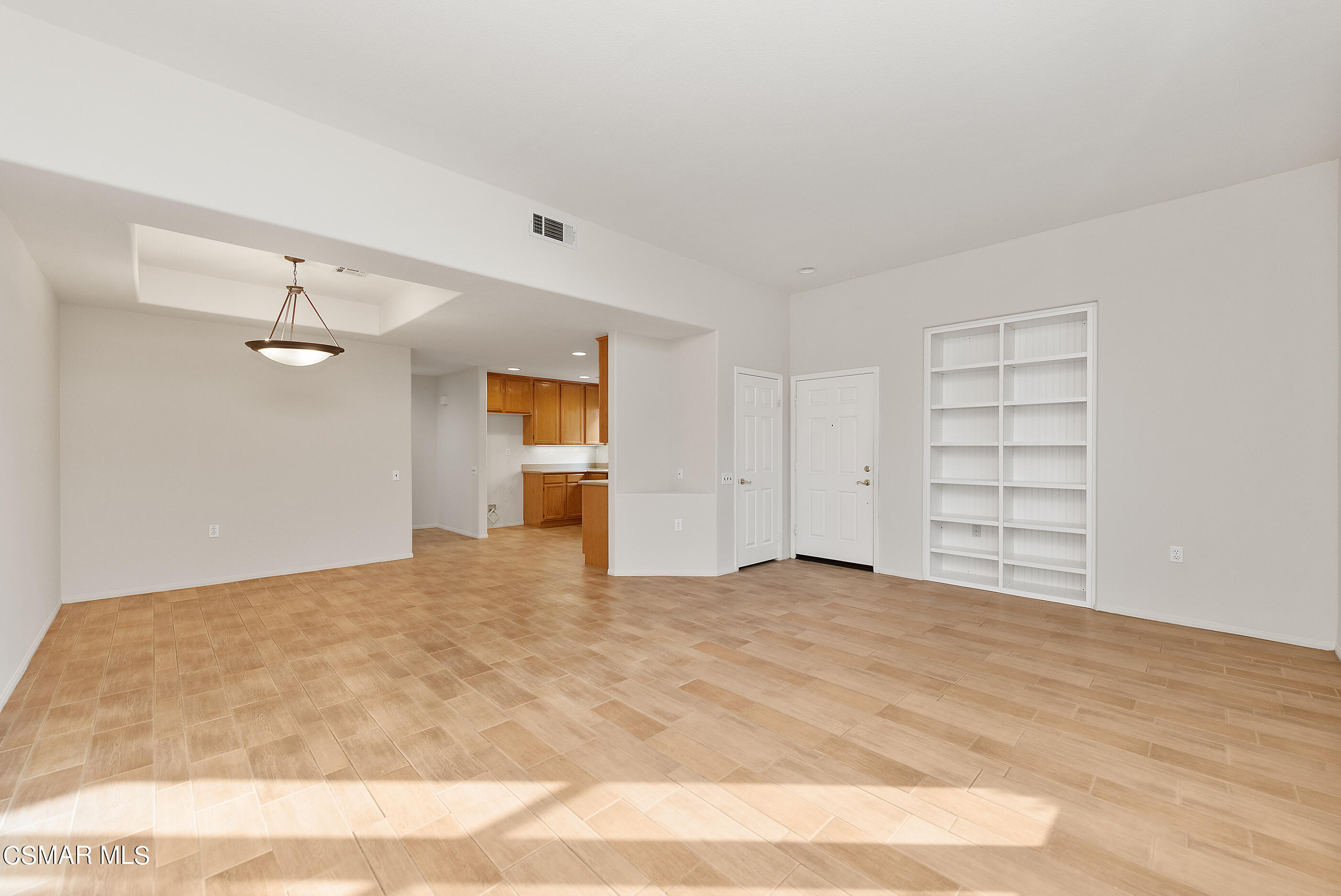 5641 Daisy Street Simi Valley, CA 93063 - Photo 5 of 49 a view of an empty room with a cabinet