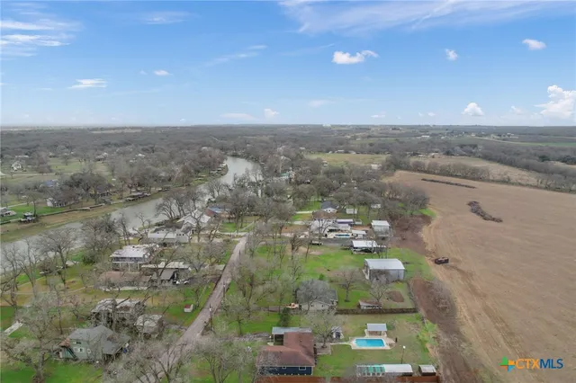 an aerial view of a house having yard