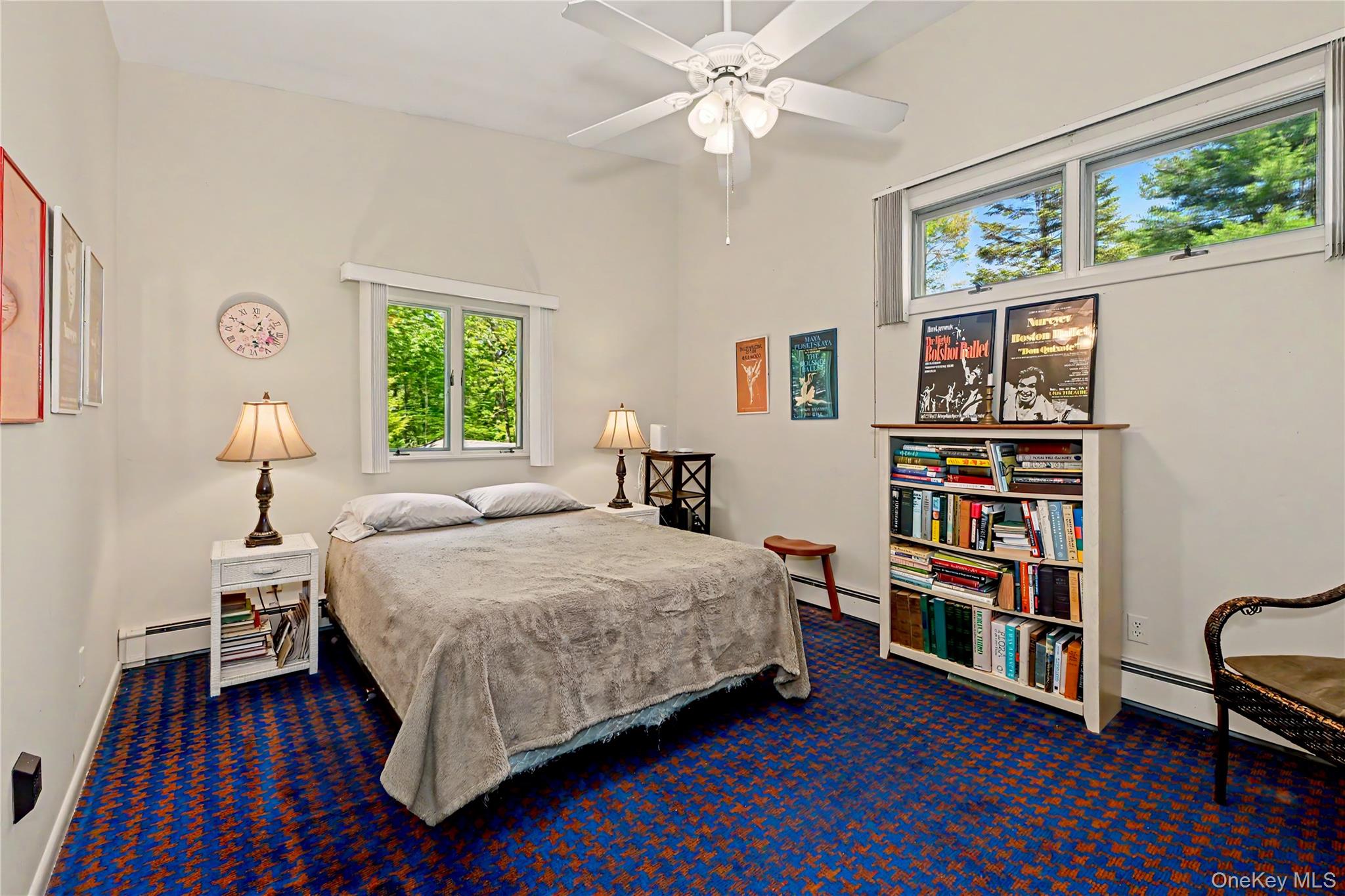 631 Croton Falls Road Carmel, NY 10512 - Photo 24 of 43 a bedroom with a bed furniture and a book shelf