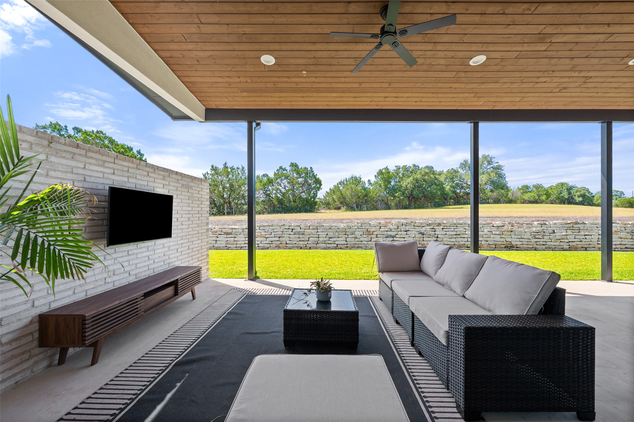 402 Rolling Hills Road Liberty Hill, TX 78642 - Photo 11 of 40 Your own seating area right off of the primary bedroom