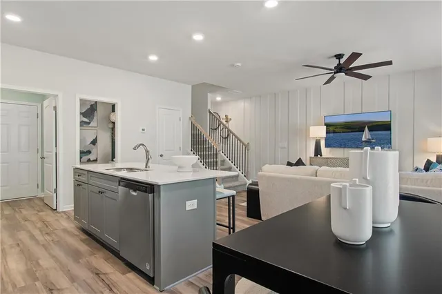 a kitchen with a sink a stove and refrigerator