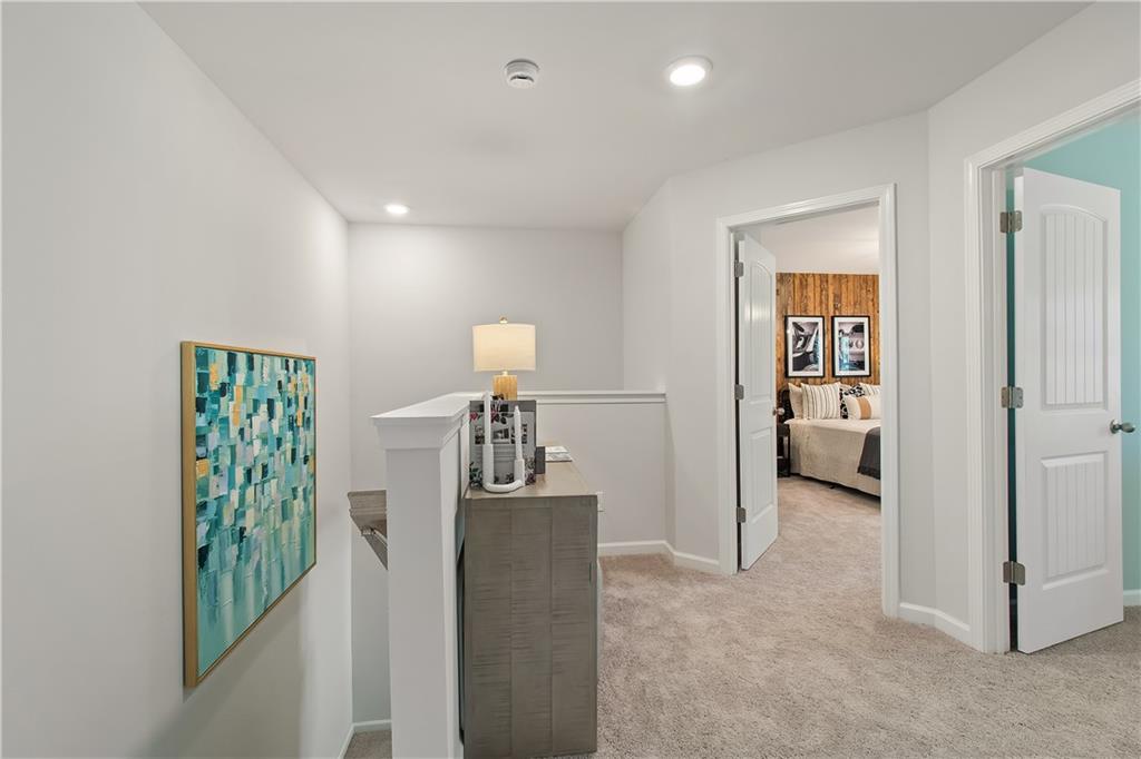 631 Treasure Drive Stockbridge, GA 30281 - Photo 20 of 33 a view of hallway with livingroom and stairs
