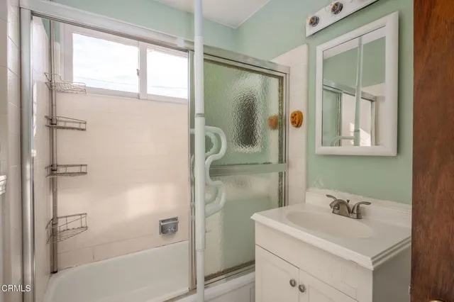 an empty room with closet area