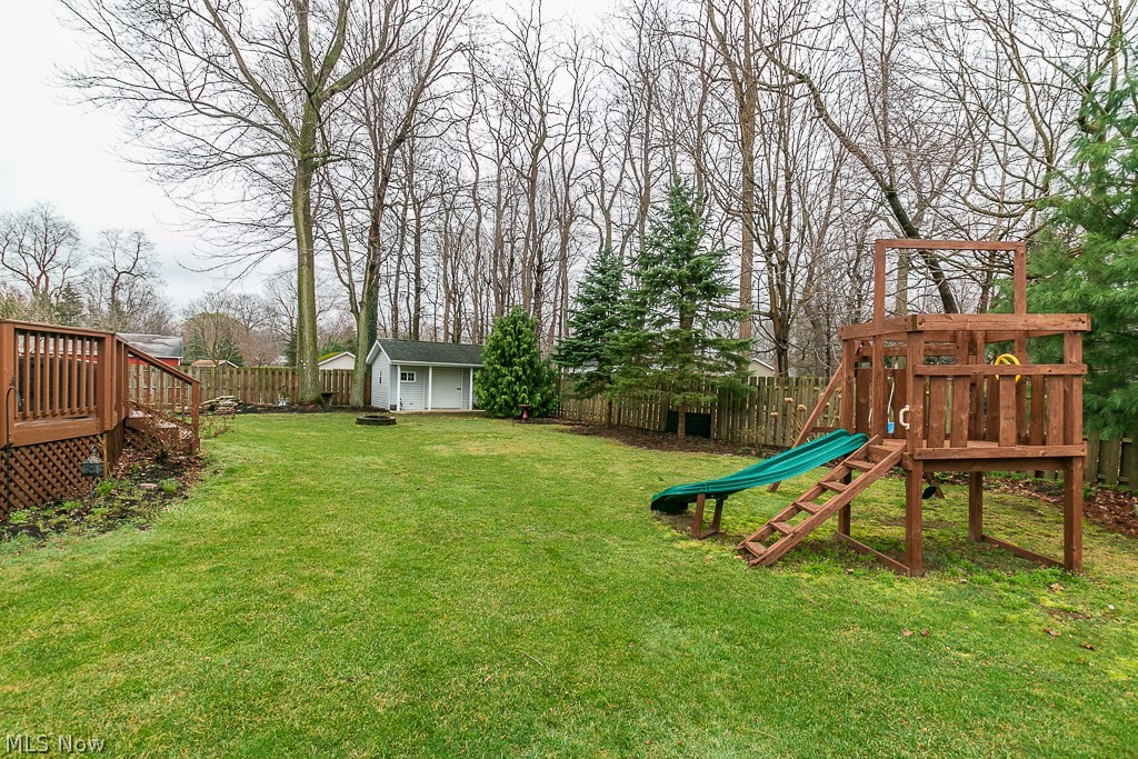 242 Overlook Road Painesville, OH 44077 - Photo 28 of 33 Playtime for the young ones on the outdoor playset!