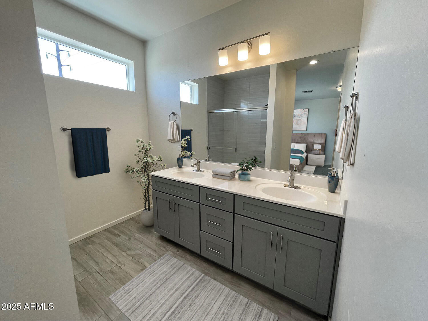 701 North McQueen Road, Unit 12 Chandler, AZ 85225 - Photo 10 of 15 a bathroom with a double vanity sink and mirror