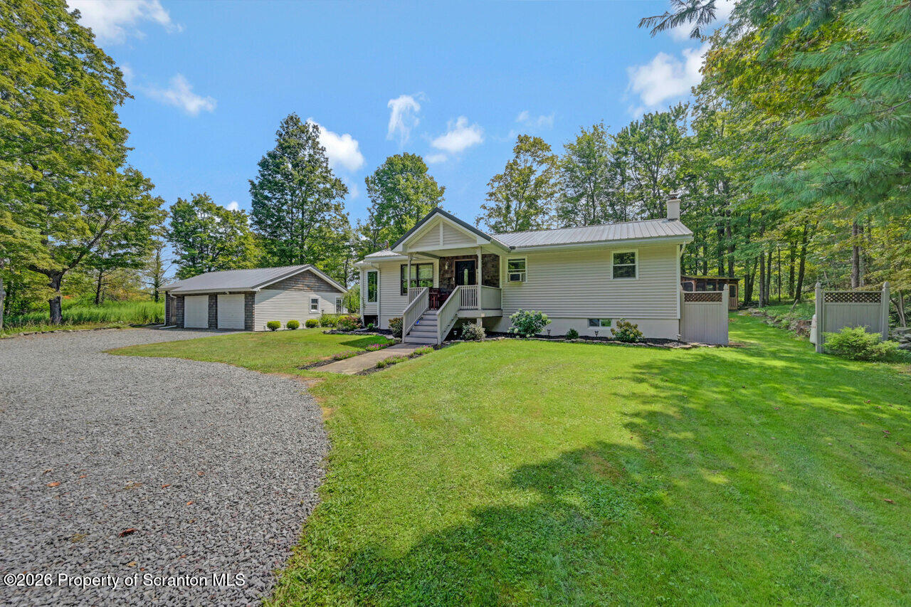 3660 Aberdeen Road Moscow, PA 18444 - Photo 2 of 68 a front view of house with yard and green space
