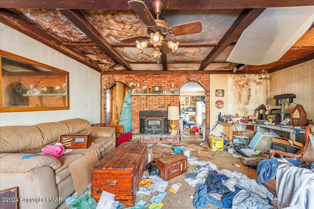 1902 Donalds Road Effort, PA 18330 - Photo 8 of 17 a living room with lots of furniture and a large window