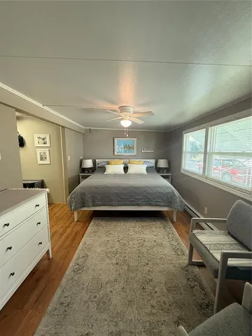 a bed room with a bed and a window