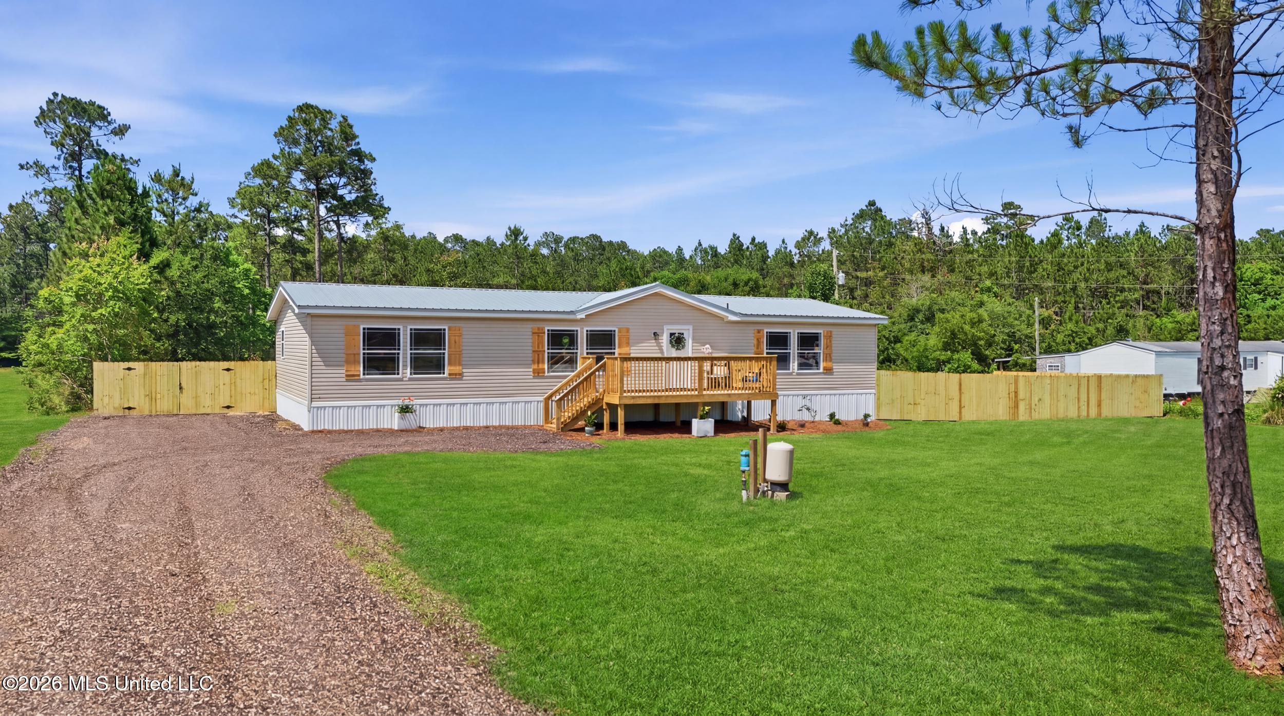 11604 Fox Ridge Drive Vancleave, MS 39565 - Photo 1 of 49 5_dji_20260513144516_0575_d - grass