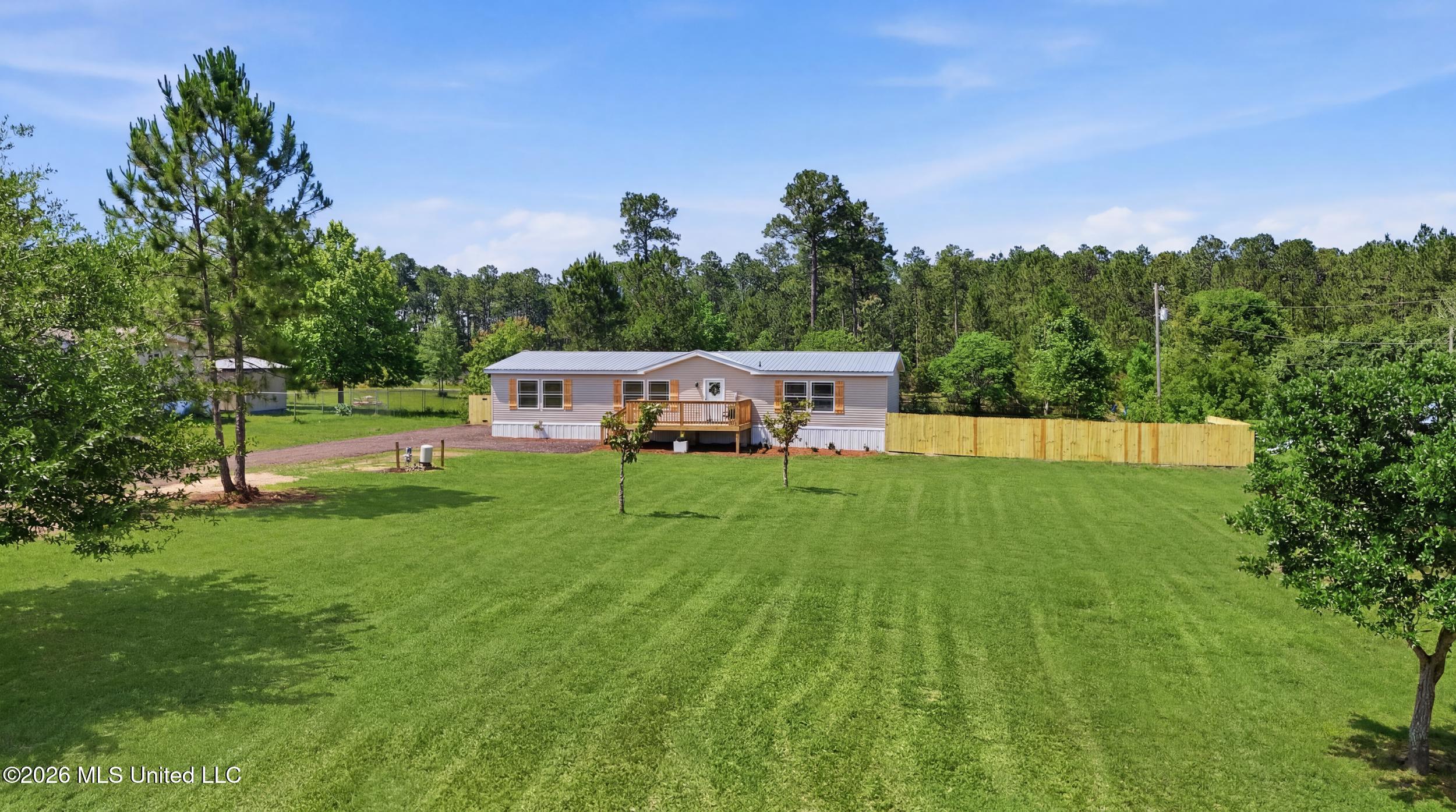 11604 Fox Ridge Drive Vancleave, MS 39565 - Photo 46 of 49 9_dji_20260513144428_0572_d - grass