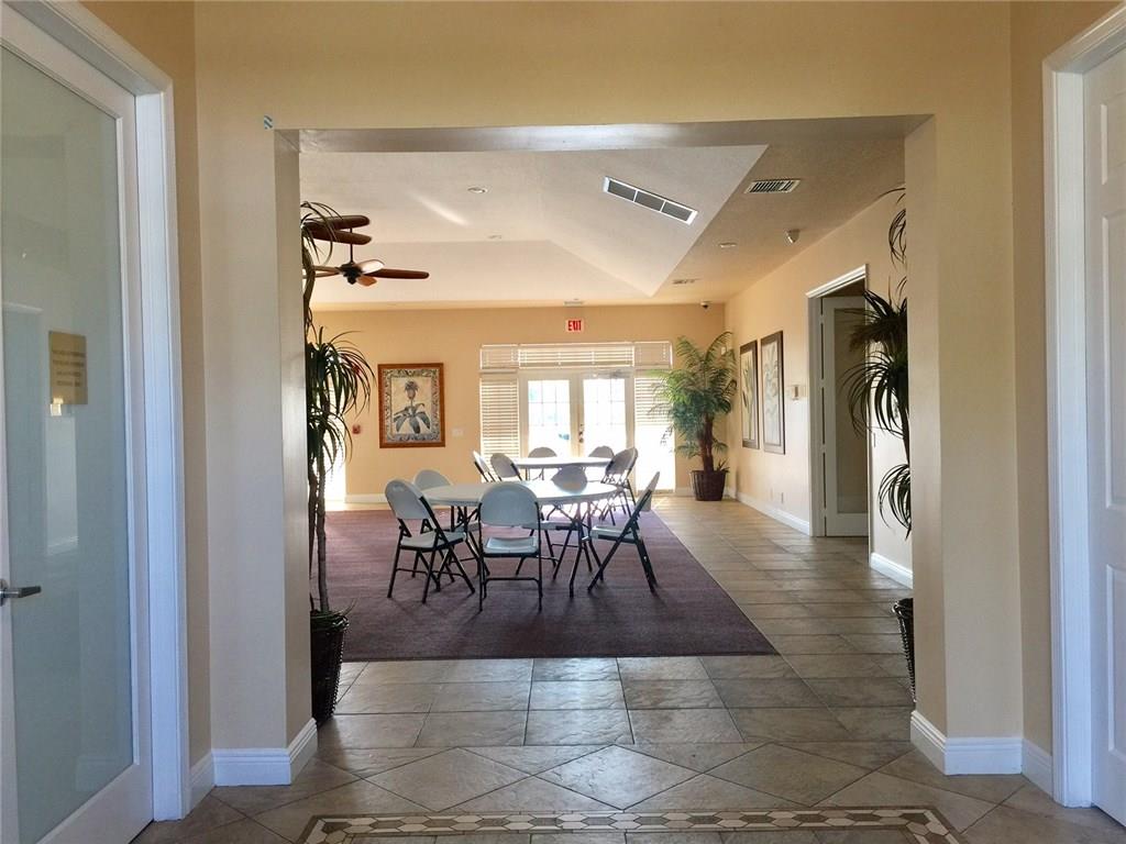 2498 Southwest Regency Road Stuart, FL 34997 - Photo 38 of 47 a view of a dining room with furniture