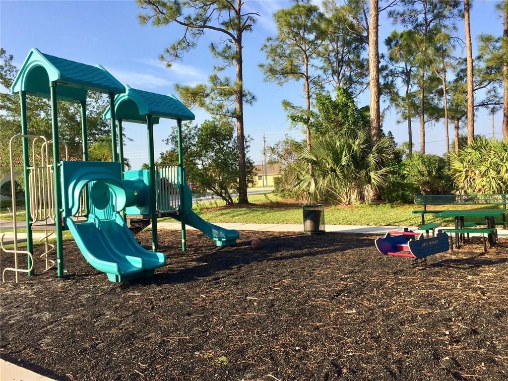 2498 Southwest Regency Road Stuart, FL 34997 - Photo 43 of 47 a view of a park with slide
