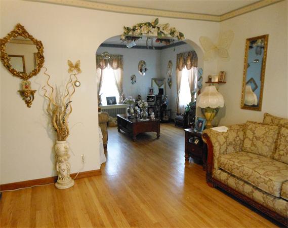 38-40 Jenness Street Springfield, MA 01104 - Photo 11 of 21 a living room with furniture and wooden floor