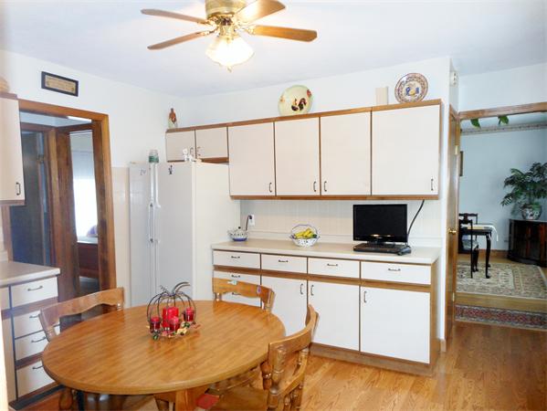 38-40 Jenness Street Springfield, MA 01104 - Photo 3 of 21 a kitchen with a table and chairs