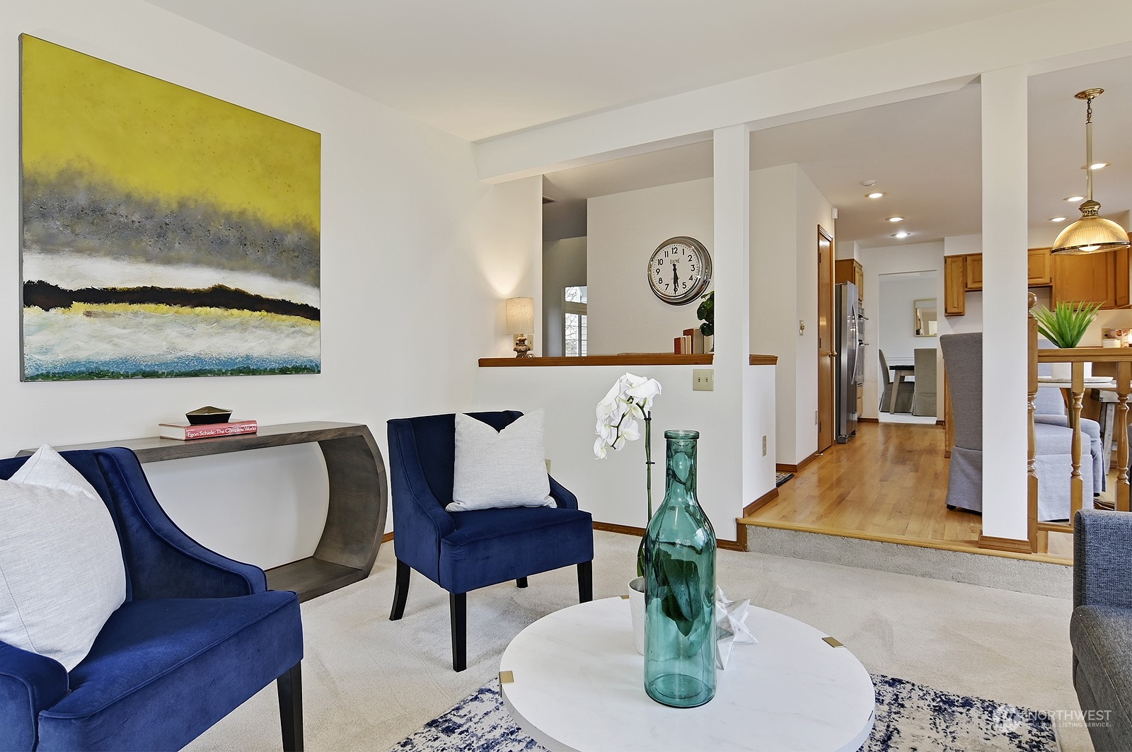 9117 Northeast 151st Street Bothell, WA 98011 - Photo 13 of 31 a living room with furniture and a floor to ceiling window