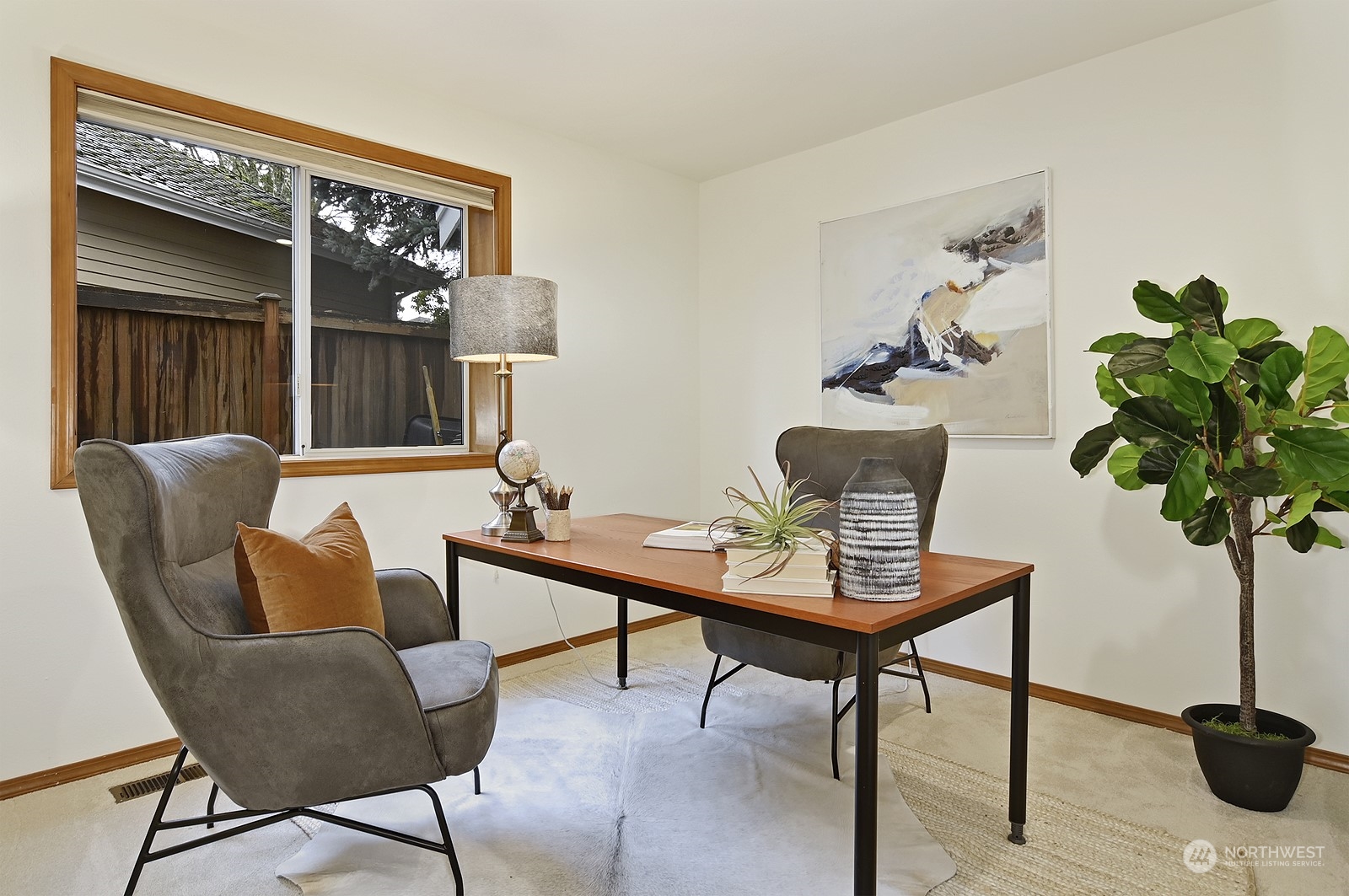 9117 Northeast 151st Street Bothell, WA 98011 - Photo 14 of 31 a view of a livingroom with furniture and a potted plant