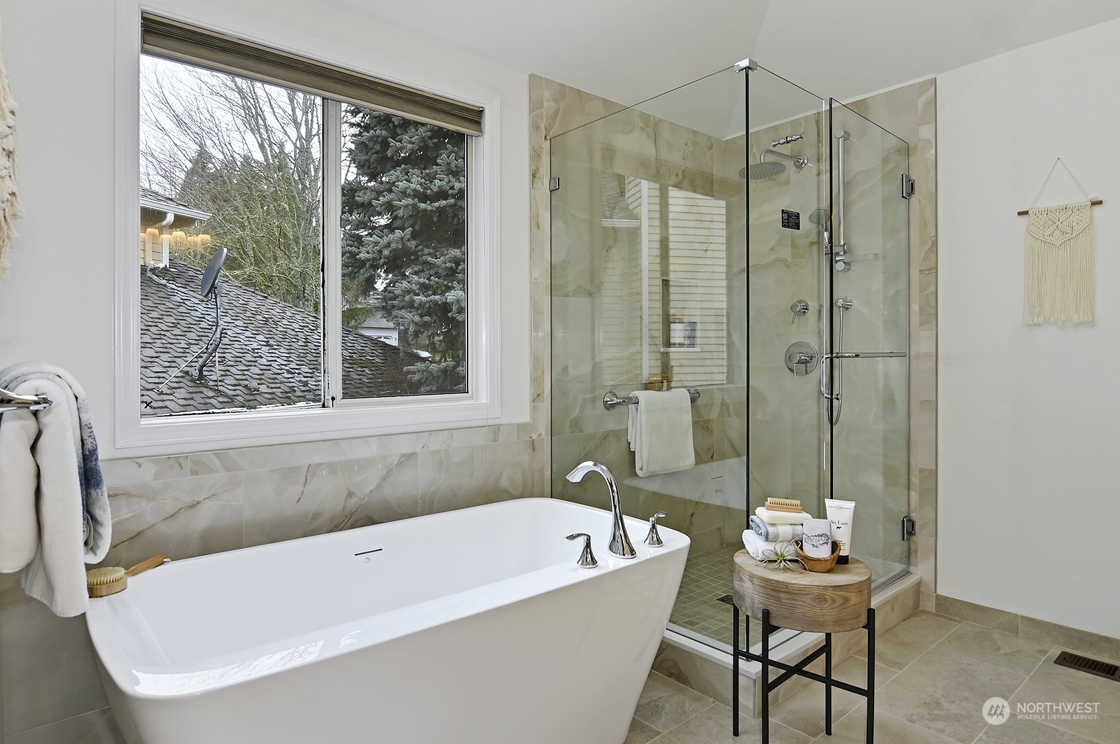 9117 Northeast 151st Street Bothell, WA 98011 - Photo 19 of 31 a bathroom with a tub a sink and a shower