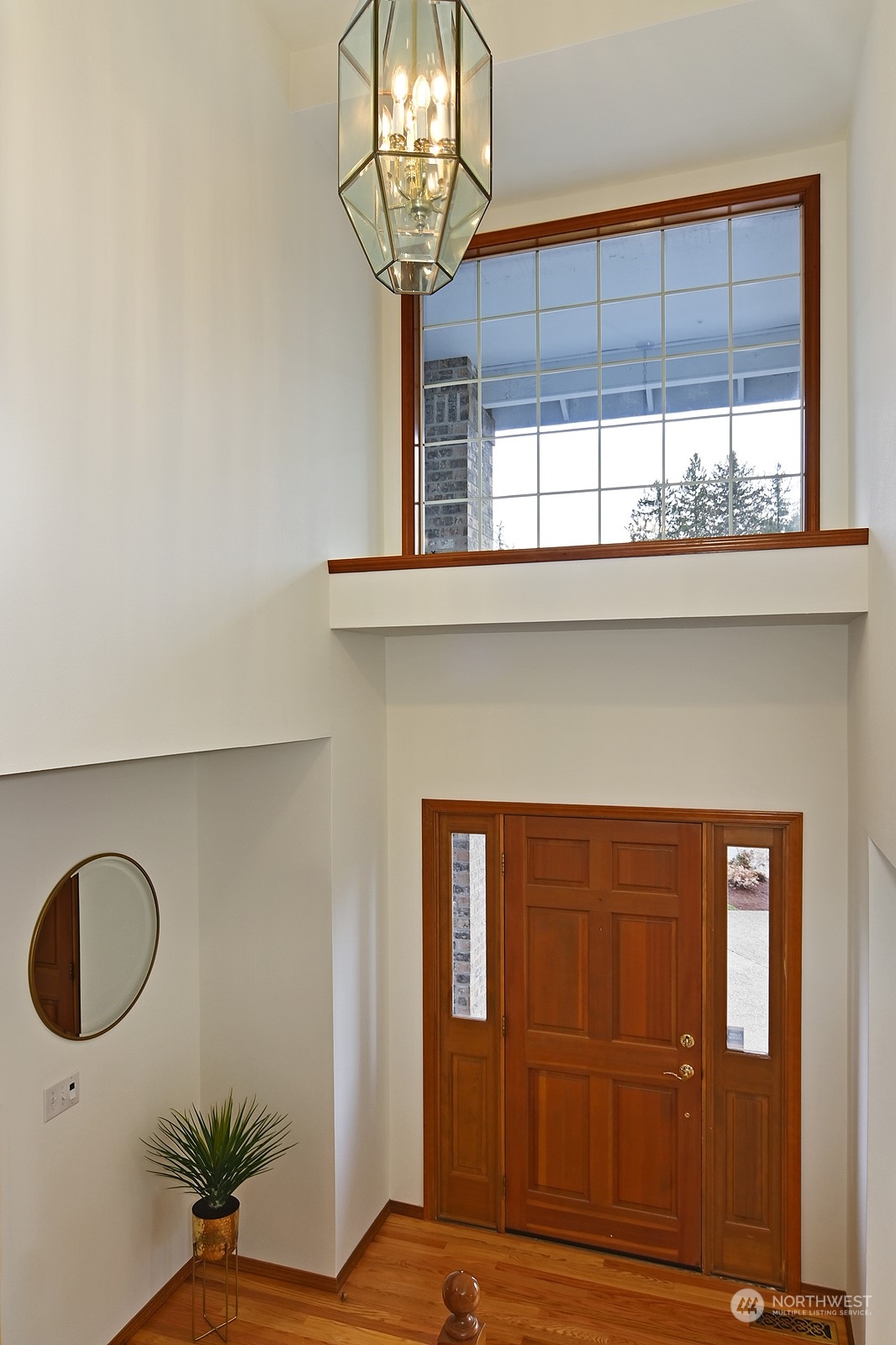 9117 Northeast 151st Street Bothell, WA 98011 - Photo 2 of 31 a front view of a house with entryway