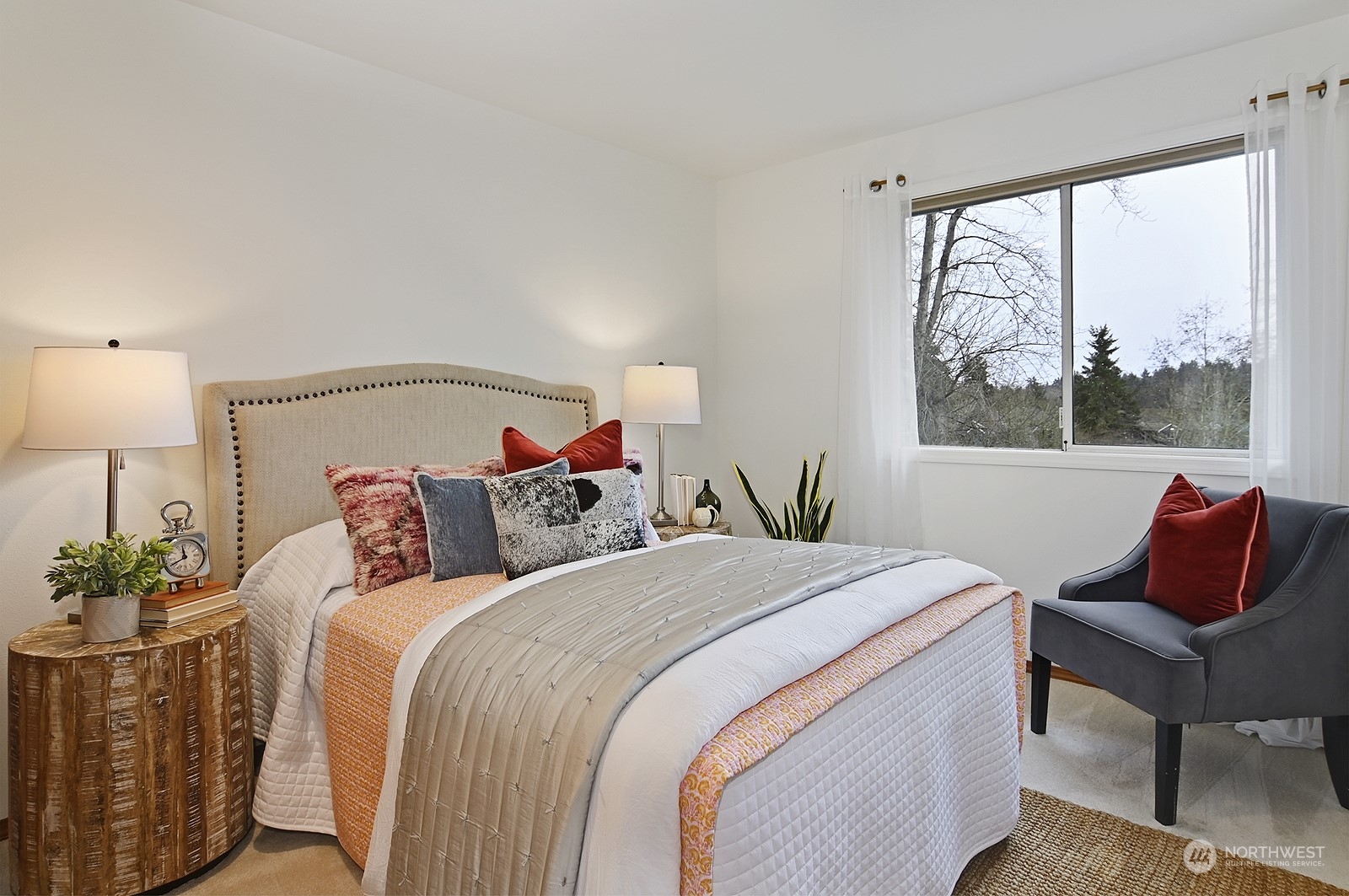 9117 Northeast 151st Street Bothell, WA 98011 - Photo 24 of 31 a bedroom with two beds and a large window