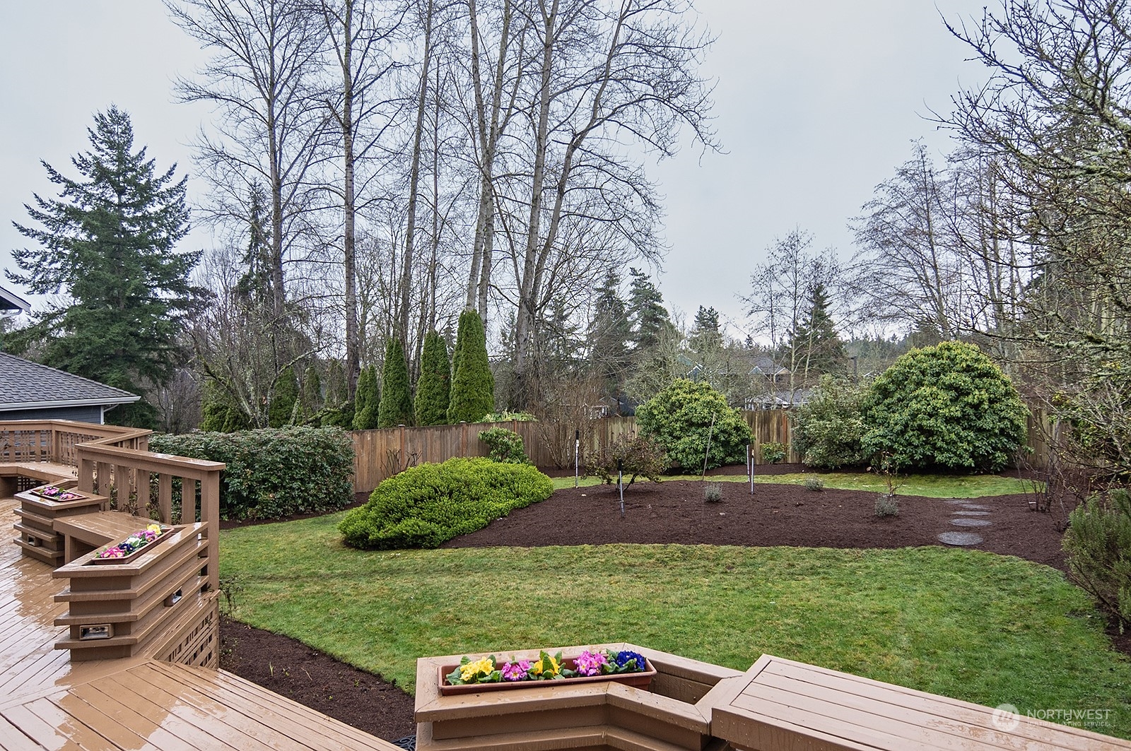 9117 Northeast 151st Street Bothell, WA 98011 - Photo 27 of 31 a view of a backyard with sitting area