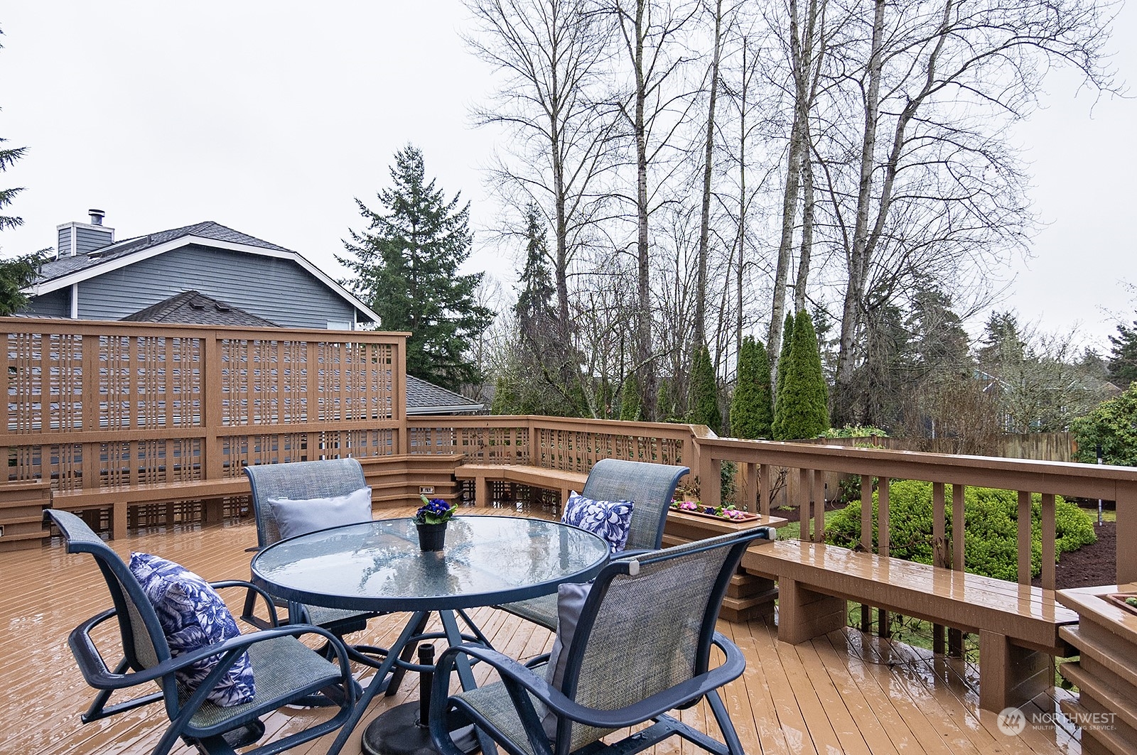 9117 Northeast 151st Street Bothell, WA 98011 - Photo 28 of 31 a view of balcony with furniture and trees