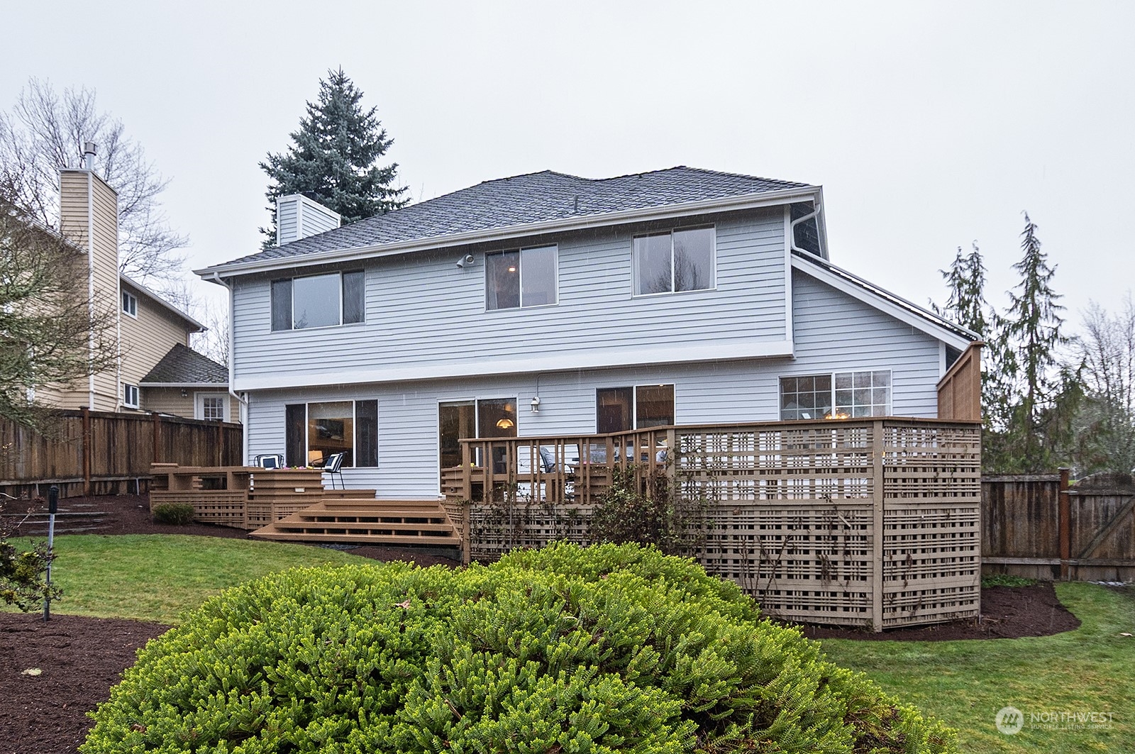 9117 Northeast 151st Street Bothell, WA 98011 - Photo 30 of 31 a front view of a house with garden