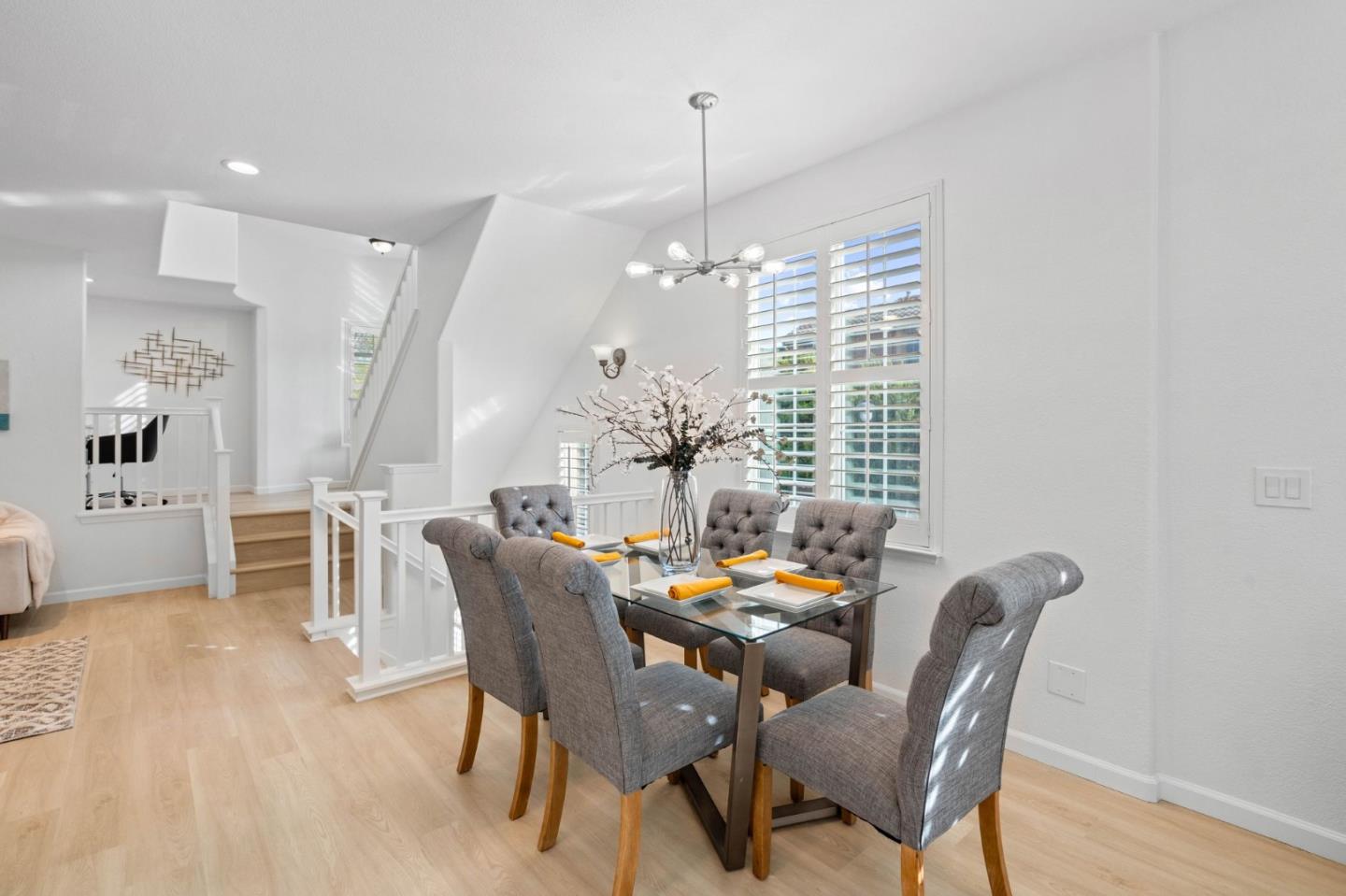 4203 Tobin Circle Santa Clara, CA 95054 - Photo 14 of 51 a dining room with furniture a chandelier and wooden floor