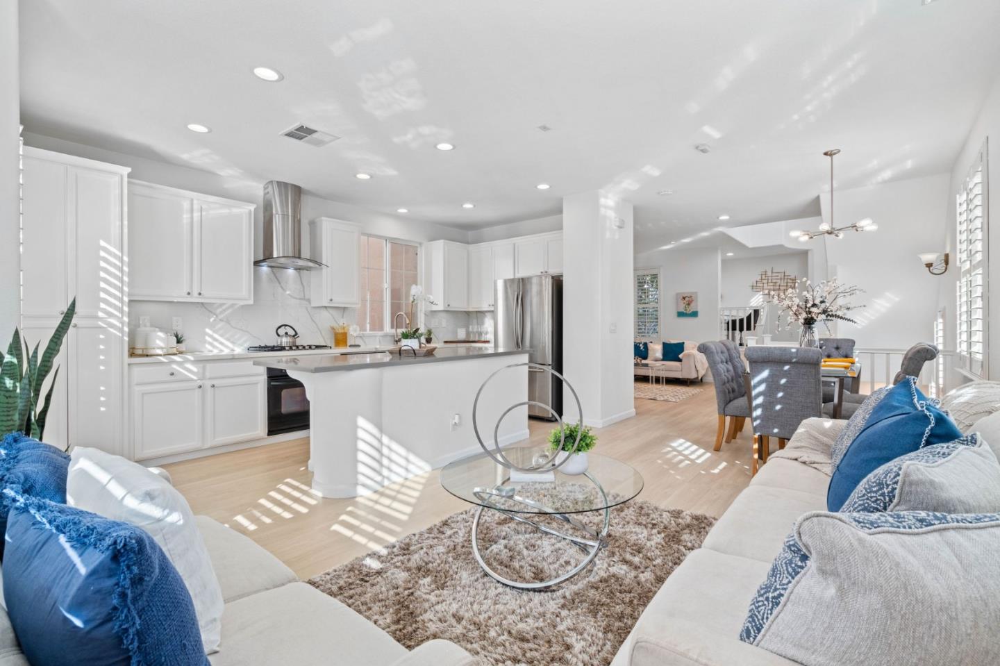 4203 Tobin Circle Santa Clara, CA 95054 - Photo 16 of 51 a living room with kitchen island furniture and a view of kitchen