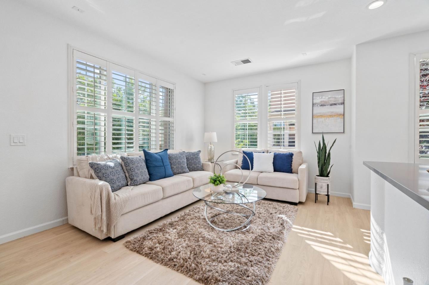 4203 Tobin Circle Santa Clara, CA 95054 - Photo 17 of 51 a living room with furniture and a large window