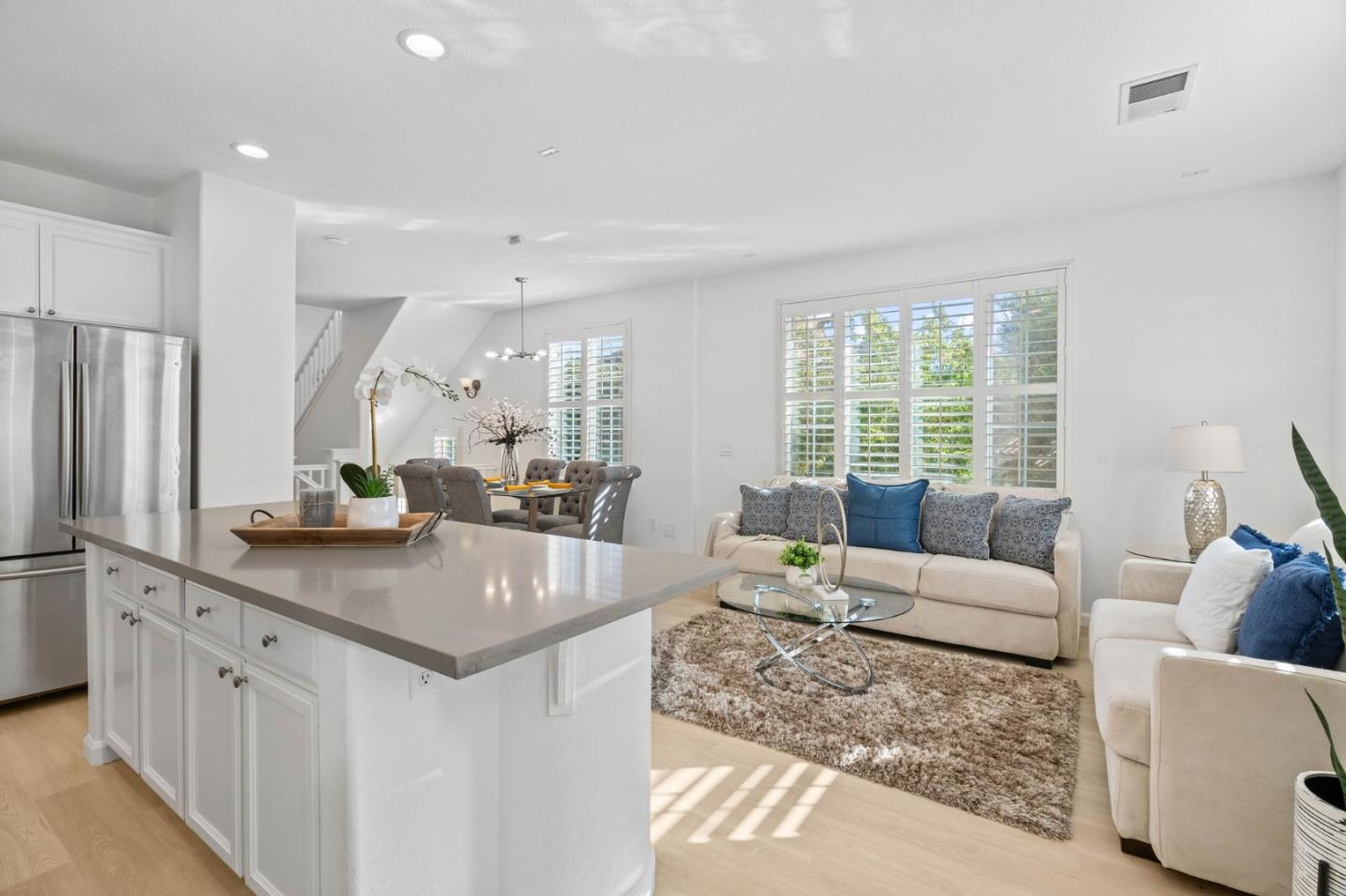 4203 Tobin Circle Santa Clara, CA 95054 - Photo 18 of 51 a living room with stainless steel appliances granite countertop a sink dishwasher a couches with wooden floor