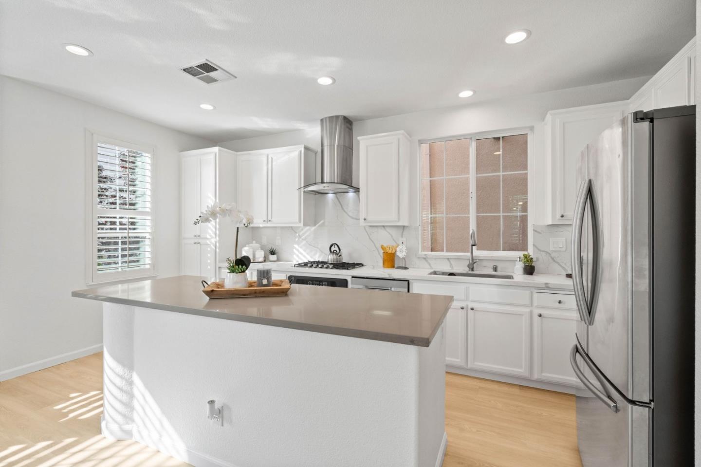 4203 Tobin Circle Santa Clara, CA 95054 - Photo 23 of 51 a kitchen with stainless steel appliances granite countertop a sink stove and refrigerator