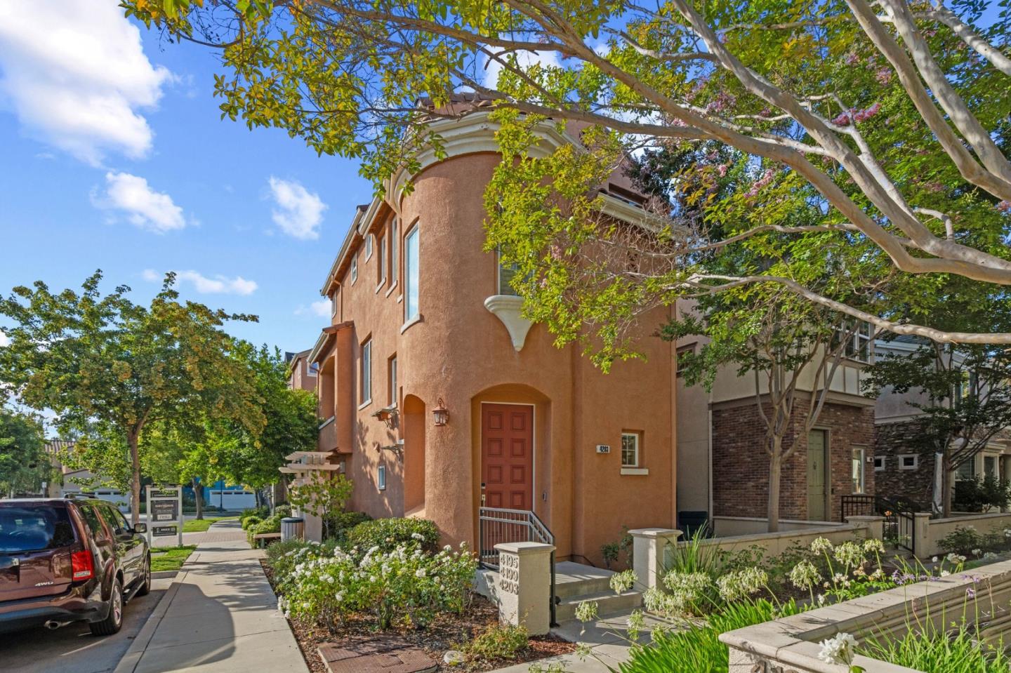 4203 Tobin Circle Santa Clara, CA 95054 - Photo 4 of 51 a couple of cars parked in front of a house