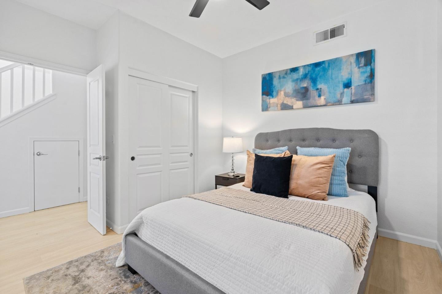 4203 Tobin Circle Santa Clara, CA 95054 - Photo 8 of 51 a bedroom with a bed and a painting on the wall