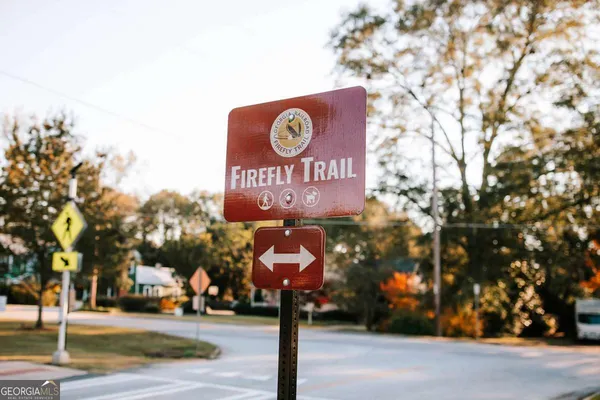 a street sign on a pole on a street